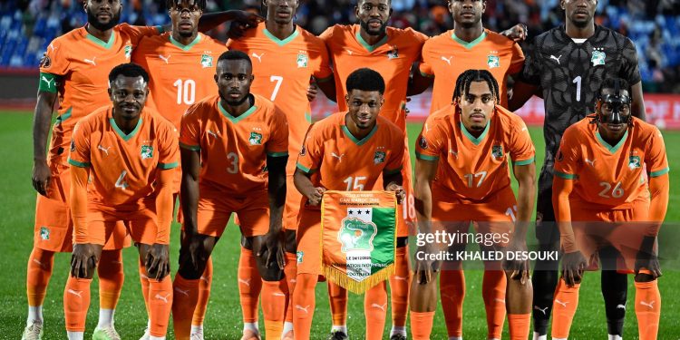 The Ivory Coast team line up ahead of the Africa Cup of Nations (CAN) Group F football match between Ivory Coast and Mozambique at Marrakesh Stadium in Marrakesh on December 24, 2025. (Photo by Khaled DESOUKI / AFP via Getty Images)