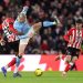 SUNDERLAND, ENGLAND - JANUARY 01: Erling Haaland of Manchester City battles for possession with Nordi Mukiele of Sunderland during the Premier League match between Sunderland and Manchester City at Stadium of Light on January 01, 2026 in Sunderland, England. (Photo by George Wood/Getty Images)
