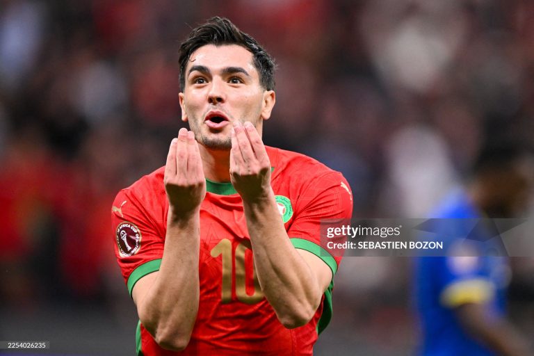 TOPSHOT - Morocco's forward #10 Brahim Diaz celebrates scoring his team's first goal during the Africa Cup of Nations (CAN) round of 16 football match between Morocco and Tanzania at Prince Moulay Abdallah Stadium in Rabat on January 4, 2026. (Photo by SEBASTIEN BOZON / AFP via Getty Images)