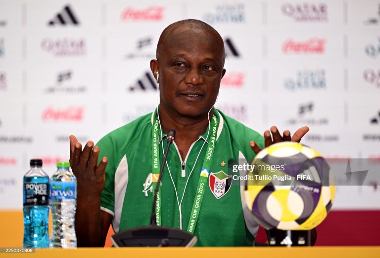 DOHA, QATAR - DECEMBER 06: James Kwesi Appiah, Head Coach of Sudan, speaks to the media in a post match press conference after the FIFA Arab Cup 2025 Group D match between Sudan and Iraq at Stadium 974 on December 06, 2025 in Doha, Qatar.  (Photo by Tullio Puglia - FIFA/FIFA via Getty Images)