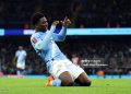 MANCHESTER, ENGLAND - JANUARY 10: Ryan McAidoo of Manchester City celebrates scoring his team's ninth goal during the Emirates FA Cup Third Round match between Manchester City and Exeter City at Etihad Stadium on January 10, 2026 in Manchester, England. (Photo by Mark Thompson/Getty Images)