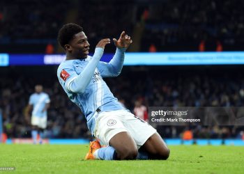 MANCHESTER, ENGLAND - JANUARY 10: Ryan McAidoo of Manchester City celebrates scoring his team's ninth goal during the Emirates FA Cup Third Round match between Manchester City and Exeter City at Etihad Stadium on January 10, 2026 in Manchester, England. (Photo by Mark Thompson/Getty Images)