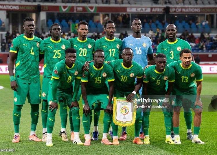 TANGIER, MOROCCO - DECEMBER 30:  Senegal players pose for a team photograph prior to the Africa Cup Of Nations Group D match between Benin and Senegal at the Grand Stade de Tanger on December 30, 2025 in Tangier, Morocco. (Photo by Visionhaus/Getty Images)