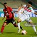 Egypts al-Ahly player Hossam Ashour (L) fights for the ball against Zamalek's Ahmed Madbouly during the the Egyptian Premier League football match between Al-Ahly and Zamalek at the Cairo Stadium in the Egyptian capital on January 8, 2018. / AFP PHOTO / KHALED DESOUKI        (Photo credit should read KHALED DESOUKI/AFP via Getty Images)