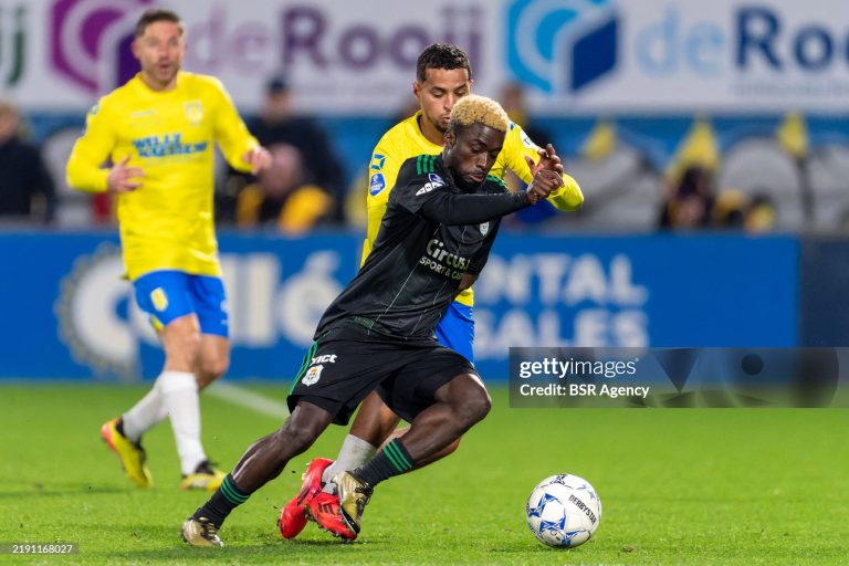 WAALWIJK, NETHERLANDS - DECEMBER 20: Braydon Marvin Manu of PEC Zwolle interacts with Mohamed Ihattaren of RKC Waalwijk during the Dutch Eredivisie match between RKC Waalwijk and PEC Zwolle at Mandemakers Stadion on December 20, 2024 in Waalwijk, Netherlands. (Photo by Joris Verwijst/BSR Agency/Getty Images)