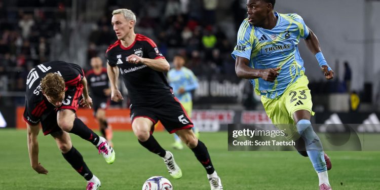 WASHINGTON, DC - FEBRUARY 21: Ezekiel Alladoh #23 of the Philadelphia Union kicks the ball in front of Silvan Hefti #5 of D.C. United during the second half of the match at Audi Field on February 21, 2026 in Washington, DC. (Photo by Scott Taetsch/Getty Images)