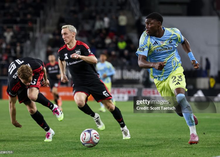 WASHINGTON, DC - FEBRUARY 21: Ezekiel Alladoh #23 of the Philadelphia Union kicks the ball in front of Silvan Hefti #5 of D.C. United during the second half of the match at Audi Field on February 21, 2026 in Washington, DC. (Photo by Scott Taetsch/Getty Images)