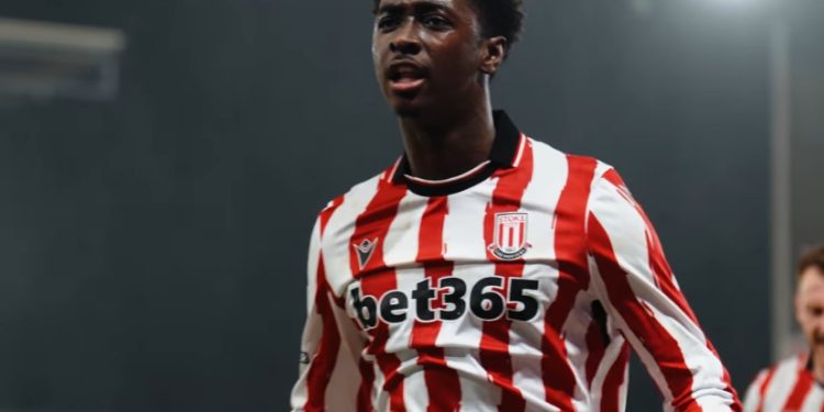 Jerusan Rak-Sakyi celebrates Stoke City's debut goal against Oxford United