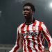 Jerusan Rak-Sakyi celebrates Stoke City's debut goal against Oxford United