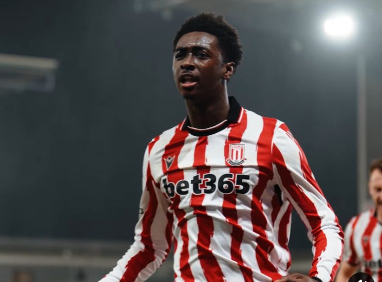 Jerusan Rak-Sakyi celebrates Stoke City's debut goal against Oxford United