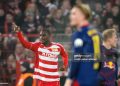 dpatop - 13 December 2025, Berlin: Soccer: Bundesliga, 1. FC Union Berlin - RB Leipzig, Matchday 14, An der Alten Försterei, Ilyas Ansah (1. FC Union Berlin) celebrates his goal to make it 2-1. Photo: Soeren Stache/dpa - IMPORTANT NOTE: In accordance with the regulations of the DFL German Football League and the DFB German Football Association, it is prohibited to utilize or have utilized photographs taken in the stadium and/or of the match in the form of sequential images and/or video-like photo series. (Photo by Soeren Stache/picture alliance via Getty Images)