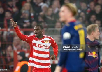 dpatop - 13 December 2025, Berlin: Soccer: Bundesliga, 1. FC Union Berlin - RB Leipzig, Matchday 14, An der Alten Försterei, Ilyas Ansah (1. FC Union Berlin) celebrates his goal to make it 2-1. Photo: Soeren Stache/dpa - IMPORTANT NOTE: In accordance with the regulations of the DFL German Football League and the DFB German Football Association, it is prohibited to utilize or have utilized photographs taken in the stadium and/or of the match in the form of sequential images and/or video-like photo series. (Photo by Soeren Stache/picture alliance via Getty Images)