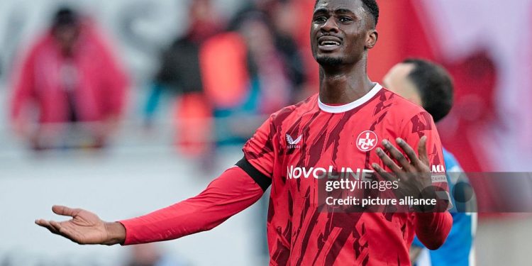 20 December 2025, Rhineland-Palatinate, Kaiserslautern: Soccer, Bundesliga 2, 1. FC Kaiserslautern - 1. FC Magdeburg, Matchday 17, Fritz-Walter-Stadion. Maxwell Gyamfi (1. FC Kaiserslautern) gestures. The match ended 2:3. Photo: Uwe Anspach/dpa - IMPORTANT NOTE: In accordance with the regulations of the DFL German Football League and the DFB German Football Association, it is prohibited to utilize or have utilized photographs taken in the stadium and/or of the match in the form of sequential images and/or video-like photo series. (Photo by Uwe Anspach/picture alliance via Getty Images)