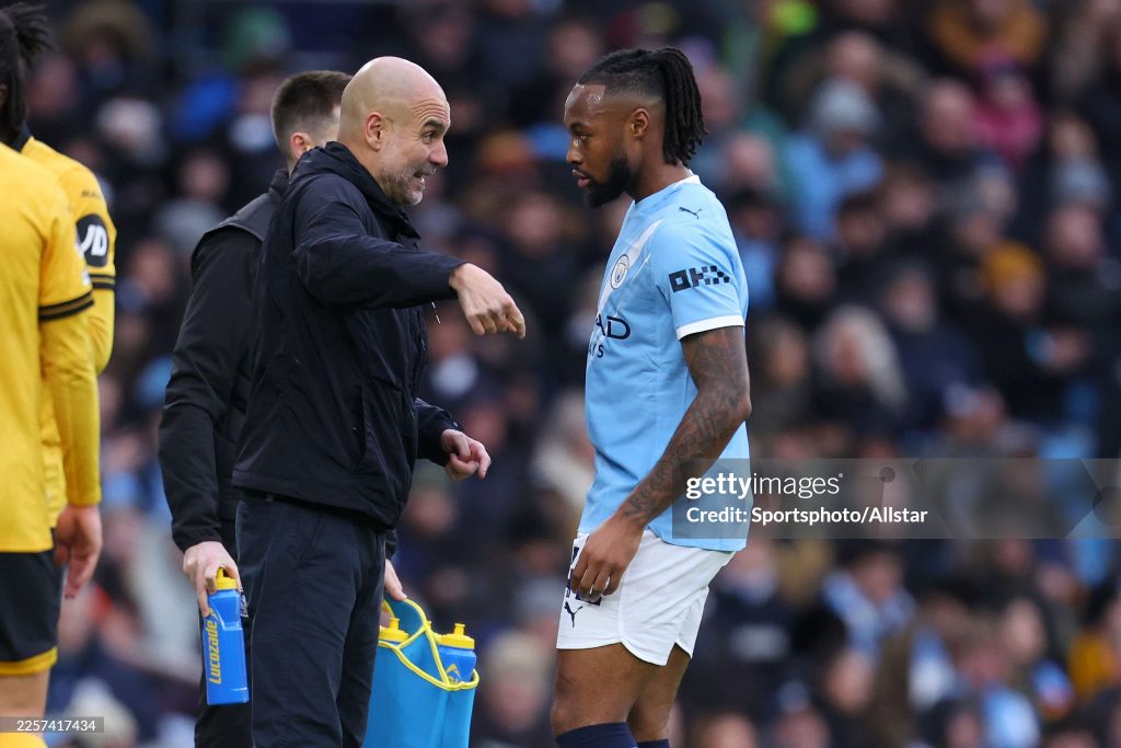 MANCHESTER, ENGLAND - JANUARY 24: Pep Guardiola, Manager of Manchester City speaks to Antoine Semenyo of Manchester City on the side line during the Premier League match between Manchester City and Wolverhampton Wanderers at Etihad Stadium on January 24, 2026 in Manchester, England. (Photo by Ed Sykes/Sportsphoto/Allstar via Getty Images)