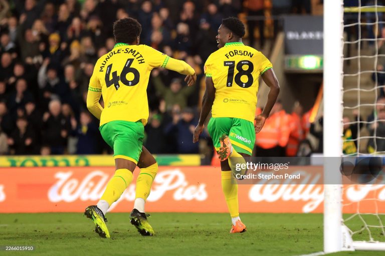 NORWICH, ENGLAND - MARCH 11: Forson Amankwah of Norwich City celebrates scoring their second goal with Errol Mundle-Smith of Norwich City during the Sky Bet Championship match between Norwich City and Sheffield United at Carrow Road on March 11, 2026 in Norwich, England. (Photo by Stephen Pond/Getty Images)