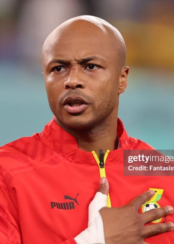 AL WAKRAH, QATAR - DECEMBER 02: Andre Ayew of Ghana reacts during the line up for the National anthems prior to kick off in the FIFA World Cup Qatar 2022 Group H match between Ghana and Uruguay at Al Janoub Stadium on December 02, 2022 in Al Wakrah, Qatar. (Photo by Youssef Loulidi/Fantasista/Getty Images)