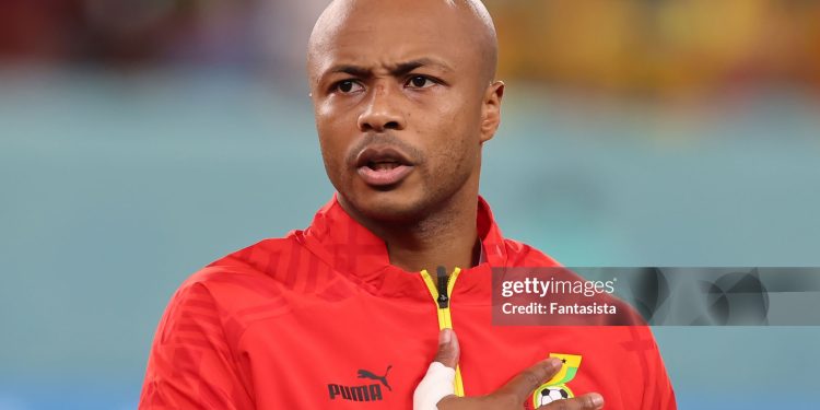 AL WAKRAH, QATAR - DECEMBER 02: Andre Ayew of Ghana reacts during the line up for the National anthems prior to kick off in the FIFA World Cup Qatar 2022 Group H match between Ghana and Uruguay at Al Janoub Stadium on December 02, 2022 in Al Wakrah, Qatar. (Photo by Youssef Loulidi/Fantasista/Getty Images)