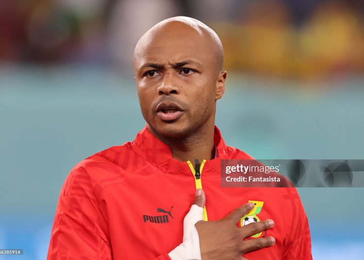 AL WAKRAH, QATAR - DECEMBER 02: Andre Ayew of Ghana reacts during the line up for the National anthems prior to kick off in the FIFA World Cup Qatar 2022 Group H match between Ghana and Uruguay at Al Janoub Stadium on December 02, 2022 in Al Wakrah, Qatar. (Photo by Youssef Loulidi/Fantasista/Getty Images)