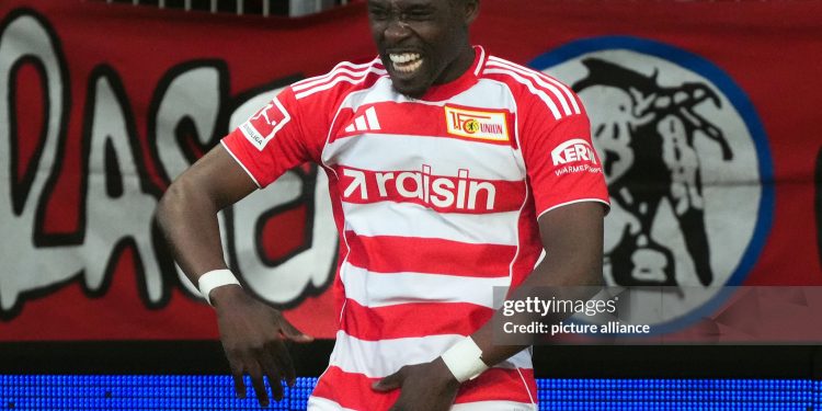 08 March 2026, Berlin: Soccer, Men: Bundesliga, 1. FC Union Berlin - SV Werder Bremen, Matchday 25, An der Alten Försterei, Derrick Köhn (1. FC Union Berlin) celebrates his penalty to make it 1-0. Photo: Soeren Stache/dpa - IMPORTANT NOTE: In accordance with the regulations of the DFL German Football League and the DFB German Football Association, it is prohibited to utilize or have utilized photographs taken in the stadium and/or of the match in the form of sequential images and/or video-like photo series. (Photo by Soeren Stache/picture alliance via Getty Images)