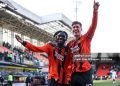 DUNDEE, SCOTLAND - MARCH 22: Dundee United's Emmanuel Agyei and Krisztian Keresztes celebrate at full time during a William Hill Premiership match between Dundee United and Celtic at the CalForth Construction Arena at Tannadice, on March 22, 2026, in Dundee, Scotland. (Photo by Craig Williamson/SNS Group via Getty Images)