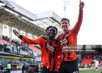 DUNDEE, SCOTLAND - MARCH 22: Dundee United's Emmanuel Agyei and Krisztian Keresztes celebrate at full time during a William Hill Premiership match between Dundee United and Celtic at the CalForth Construction Arena at Tannadice, on March 22, 2026, in Dundee, Scotland. (Photo by Craig Williamson/SNS Group via Getty Images)