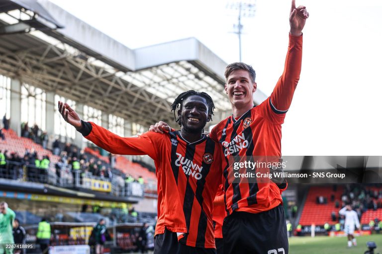 DUNDEE, SCOTLAND - MARCH 22: Dundee United's Emmanuel Agyei and Krisztian Keresztes celebrate at full time during a William Hill Premiership match between Dundee United and Celtic at the CalForth Construction Arena at Tannadice, on March 22, 2026, in Dundee, Scotland. (Photo by Craig Williamson/SNS Group via Getty Images)