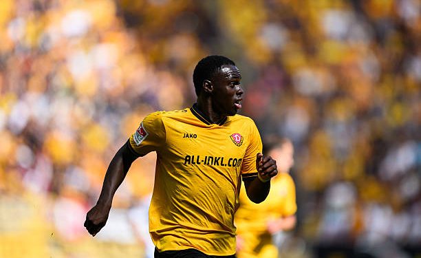 31 August 2025, Saxony, Dresden: Soccer: 2nd Bundesliga, SG Dynamo Dresden - FC Schalke 04, Matchday 4, Rudolf-Harbig-Stadion, Kofi Amoako (Dynamo Dresden) runs across the pitch. Photo: Robert Michael/dpa - IMPORTANT NOTE: In accordance with the regulations of the DFL German Football League and the DFB German Football Association, it is prohibited to utilize or have utilized photographs taken in the stadium and/or of the match in the form of sequential images and/or video-like photo series. (Photo by Robert Michael/picture alliance via Getty Images)