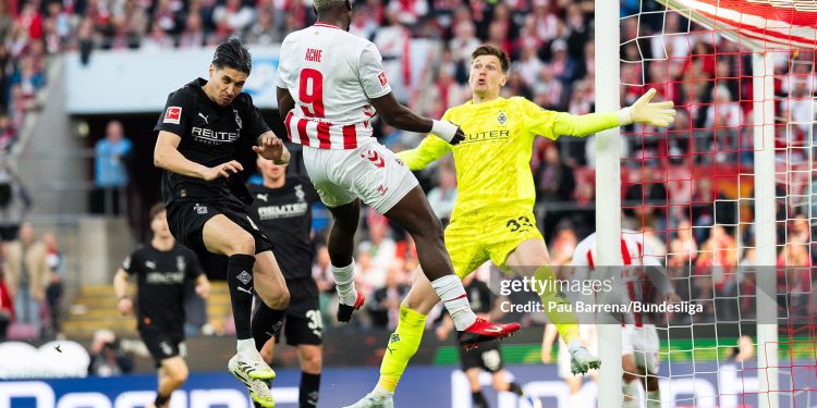 COLOGNE, GERMANY - MARCH 21: (EDITORS NOTE: Image has been digitally enhanced.) Ragnar Ache of FC Köln heads the ball during the Bundesliga match between 1. FC Köln and Borussia Mönchengladbach at RheinEnergieStadion on March 21, 2026 in Cologne, Germany. (Photo by Pau Barrena/Bundesliga/Bundesliga Collection via Getty Images)