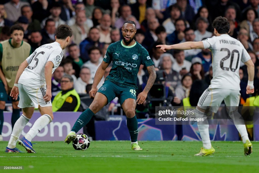 Madrid, Spain - March 11: Arda Gueler of Real Madrid, Antoine Semenyo of Manchester City and Fran Garcia of Real Madrid battle for the ball during the UEFA Champions League 2025/26 Round of 16 First Leg match between Real Madrid CF and Manchester City FC at Estadio Santiago Bernabeu on March 11, 2026 in Madrid, Spain. (Photo by Manu Reino/DeFodi Images/DeFodi via Getty Images)