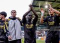 DOETINCHEM, NETHERLANDS - MARCH 8: (L-R) Yuval Ranon of Vitesse, Alexander Buttner of Vitesse, Solomon Bonnah of Vitesse, Adam Tahaui of Vitesse celebrating the victory after the match  during the Dutch Keuken Kampioen Divisie  match between De Graafschap v Vitesse at the De Vijverberg on March 8, 2026 in Doetinchem Netherlands (Photo by Jeroen van den Berg/Soccrates/Getty Images)