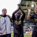 DOETINCHEM, NETHERLANDS - MARCH 8: (L-R) Yuval Ranon of Vitesse, Alexander Buttner of Vitesse, Solomon Bonnah of Vitesse, Adam Tahaui of Vitesse celebrating the victory after the match  during the Dutch Keuken Kampioen Divisie  match between De Graafschap v Vitesse at the De Vijverberg on March 8, 2026 in Doetinchem Netherlands (Photo by Jeroen van den Berg/Soccrates/Getty Images)