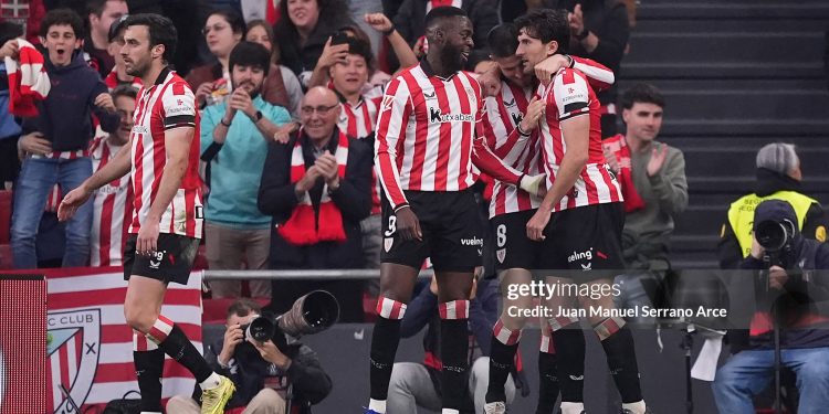 BILBAO, SPAIN - MARCH 22: Daniel Vivian of Athletic Club (R) celebrates scoring his team's first goal with teammates Inaki Williams and Inigo Lekue during the LaLiga EA Sports match between Athletic Club and Real Betis Balompie at Estadio de San Mames on March 22, 2026 in Bilbao, Spain. (Photo by Juan Manuel Serrano Arce/Getty Images)