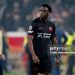 LEVERKUSEN, GERMANY - MARCH 11: Ernest Poku of Bayer 04 Leverkusen disappointed after the match  during the UEFA Champions League  match between Bayer Leverkusen v Arsenal at the BayArena on March 11, 2026 in Leverkusen Germany (Photo by Gerrit van Keulen/Soccrates/Getty Images)