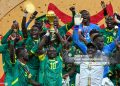 TOPSHOT - Senegal's forward #10 Sadio Mane holds the trophy after the Africa Cup of Nations (CAN) final football match between Senegal and Morocco at the Prince Moulay Abdellah Stadium in Rabat on January 18, 2026. (Photo by SEBASTIEN BOZON / AFP via Getty Images)