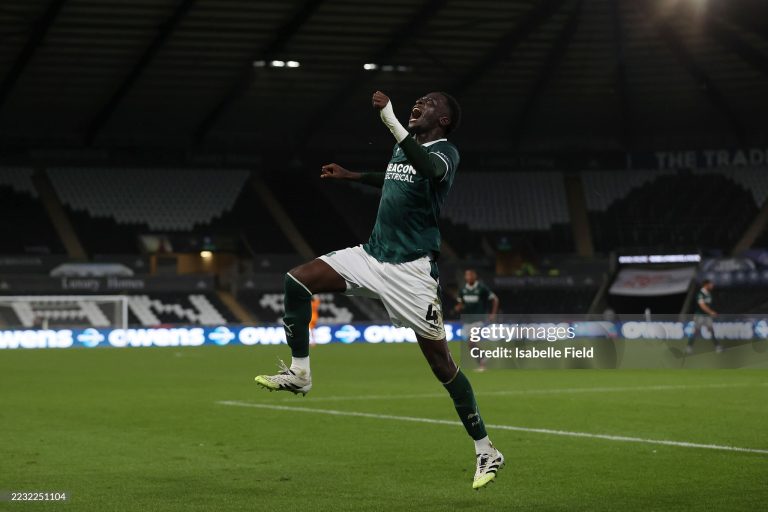 SWANSEA, WALES - AUGUST 26: Brendan Wiredu of Plymouth Argyle celebrates after scoring the equalizer during the Carabao Cup Second Round match between Swansea City and Plymouth Argyle at Swansea.com Stadium on August 26, 2025 in Swansea, Wales.  (Photo by Isabelle Field/Getty Images)