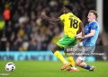 Norwich City's Forson Amankwah (left) and Derby County's Derry Murkin battle for the ball during the Sky Bet Championship match at Carrow Road, Norwich. Picture date: Tuesday April 21, 2026. (Photo by Adam Davy/PA Images via Getty Images)