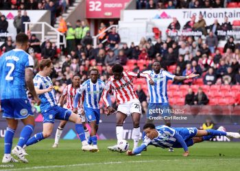 STOKE ON TRENT, ENGLAND - APRIL 03: Gabriel Otegbayo of Sheffield Wednesday dives as he attempts to block the shot from Jesurun Rak-Sakyi of Stoke City during the Sky Bet Championship match between Stoke City and Sheffield Wednesday at Bet365 Stadium on April 03, 2026 in Stoke on Trent, England. (Photo by Carl Recine/Getty Images)
