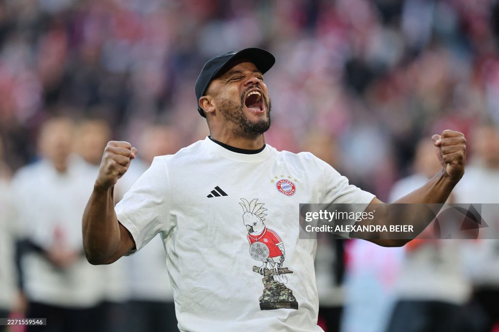 TOPSHOT - Bayern Munich's Belgian head coach Vincent Kompany celebrates after the German first division Bundesliga football match between FC Bayern Munich and VfB Stuttgart in Munich, southern Germany, on April 19, 2026. Harry Kane scored his 32nd goal of the campaign as Bayern Munich cruised to a 4-2 home win over Stuttgart and claim a record-extending 35th Bundesliga title. (Photo by Alexandra BEIER / AFP via Getty Images) / DFL REGULATIONS PROHIBIT ANY USE OF PHOTOGRAPHS AS IMAGE SEQUENCES AND/OR QUASI-VIDEO