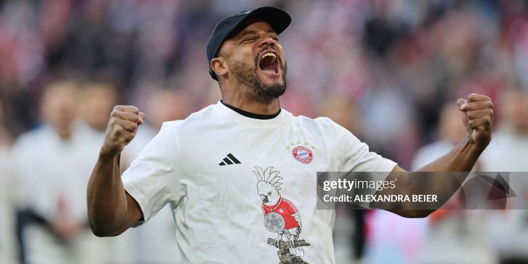 TOPSHOT - Bayern Munich's Belgian head coach Vincent Kompany celebrates after the German first division Bundesliga football match between FC Bayern Munich and VfB Stuttgart in Munich, southern Germany, on April 19, 2026. Harry Kane scored his 32nd goal of the campaign as Bayern Munich cruised to a 4-2 home win over Stuttgart and claim a record-extending 35th Bundesliga title. (Photo by Alexandra BEIER / AFP via Getty Images) / DFL REGULATIONS PROHIBIT ANY USE OF PHOTOGRAPHS AS IMAGE SEQUENCES AND/OR QUASI-VIDEO