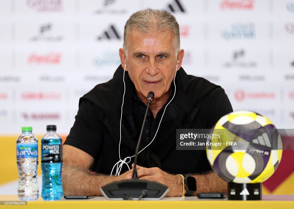 DOHA, QATAR - DECEMBER 08: Carlos Queiroz, Head Coach of Oman, speaks to the media in a post match press conference after the FIFA Arab Cup 2025 Group B match between Oman and Comoros at Stadium 974 on December 08, 2025 in Doha, Qatar. (Photo by Jan Kruger - FIFA/FIFA via Getty Images)