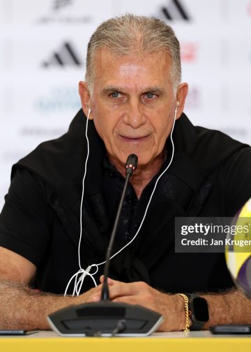 DOHA, QATAR - DECEMBER 08: Carlos Queiroz, Head Coach of Oman, speaks to the media in a post match press conference after the FIFA Arab Cup 2025 Group B match between Oman and Comoros at Stadium 974 on December 08, 2025 in Doha, Qatar. (Photo by Jan Kruger - FIFA/FIFA via Getty Images)
