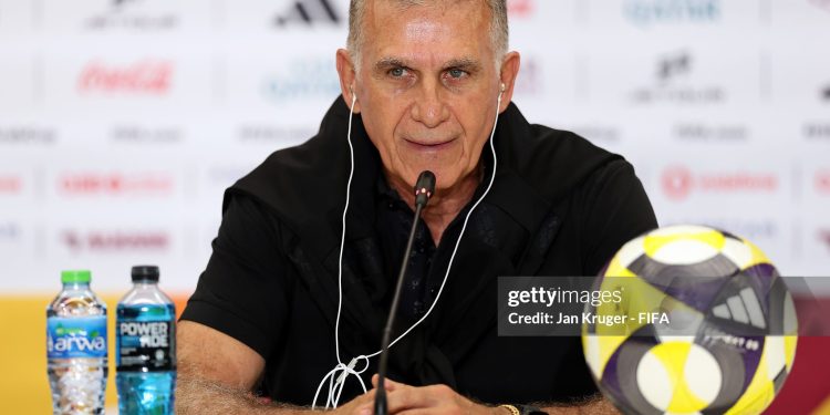 DOHA, QATAR - DECEMBER 08: Carlos Queiroz, Head Coach of Oman, speaks to the media in a post match press conference after the FIFA Arab Cup 2025 Group B match between Oman and Comoros at Stadium 974 on December 08, 2025 in Doha, Qatar. (Photo by Jan Kruger - FIFA/FIFA via Getty Images)