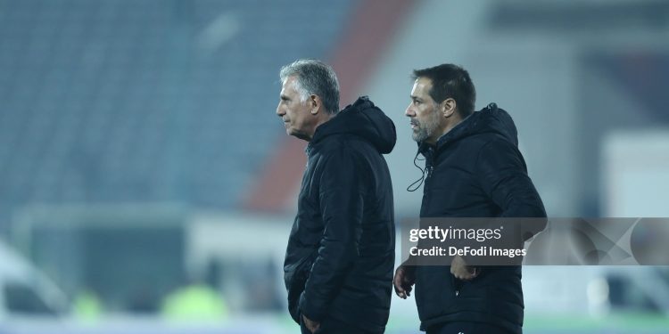 TEHRAN, IRAN - NOVEMBER 10: head coach Carlos Queiroz of Iran and head coach Roger De Sa of Iran look on during the Friendly match between Iran v Nicaragua on November 10, 2022 in Tehran, Iran. (Photo by Mohammad Karamali/DeFodi Images via Getty Images)