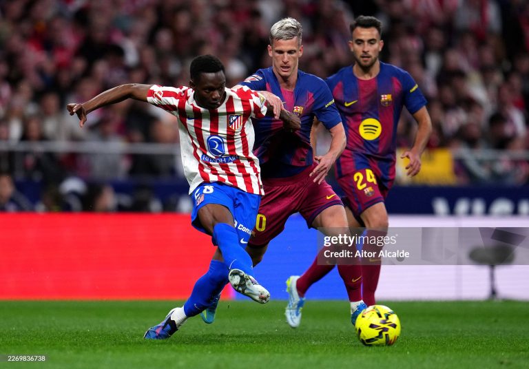 MADRID, SPAIN - APRIL 04: Taufik Seidu of Atletico de Madrid is challenged by Dani Olmo of FC Barcelona during the LaLiga EA Sports match between Atletico de Madrid and FC Barcelona at Riyadh Air Metropolitano on April 04, 2026 in Madrid, Spain. (Photo by Aitor Alcalde/Getty Images)