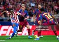 MADRID, SPAIN - APRIL 04: Taufik Seidu of Atletico de Madrid battle for the ball with Dani Olmo of FC Barcelona during the LaLiga EA Sports match between Atletico de Madrid and FC Barcelona at Riyadh Air Metropolitano on April 04, 2026 in Madrid, Spain. (Photo by Diego Souto/Getty Images)