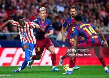 MADRID, SPAIN - APRIL 04: Taufik Seidu of Atletico de Madrid battle for the ball with Dani Olmo of FC Barcelona during the LaLiga EA Sports match between Atletico de Madrid and FC Barcelona at Riyadh Air Metropolitano on April 04, 2026 in Madrid, Spain. (Photo by Diego Souto/Getty Images)