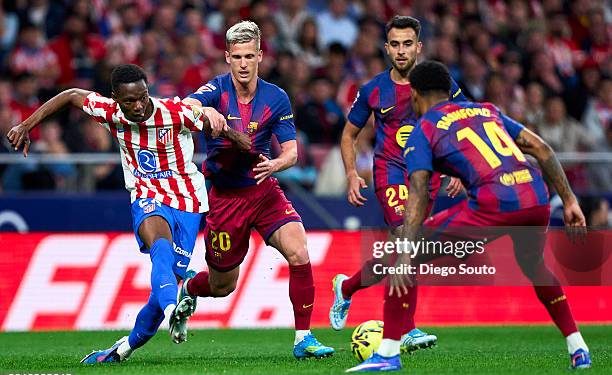 MADRID, SPAIN - APRIL 04: Taufik Seidu of Atletico de Madrid battle for the ball with Dani Olmo of FC Barcelona during the LaLiga EA Sports match between Atletico de Madrid and FC Barcelona at Riyadh Air Metropolitano on April 04, 2026 in Madrid, Spain. (Photo by Diego Souto/Getty Images)