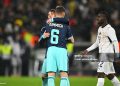 30 March 2026, Baden-Württemberg, Stuttgart: Soccer, men, international matches, Germany - Ghana, MHP Arena. Lennart Karl (back, Germany) is happy after the game with Joshua Kimmich (Germany), Kamaldeen Sulemana (Ghana) runs past the two. Photo: Tom Weller/dpa - IMPORTANT NOTE: In accordance with the regulations of the DFL German Football League and the DFB German Football Association, it is prohibited to utilize or have utilized photographs taken in the stadium and/or of the match in the form of sequential images and/or video-like photo series. (Photo by Tom Weller/picture alliance via Getty Images)