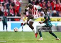 COLOGNE, GERMANY - APRIL 12: Ragnar Ache of 1. FC Koln scores his team's second goal during the Bundesliga match between 1. FC Köln and SV Werder Bremen at RheinEnergieStadion on April 12, 2026 in Cologne, Germany. (Photo by Dean Mouhtaropoulos/Getty Images)