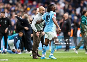 LONDON, ENGLAND - MAY 16: Head Coach Pep Guardiola with winning goal-scorer Antoine Semenyo of Manchester City after his sides 1-0 win during the Emirates FA Cup Final match between Chelsea and Manchester City on May 16, 2026 in London, England. (Photo by Robin Jones/Getty Images)